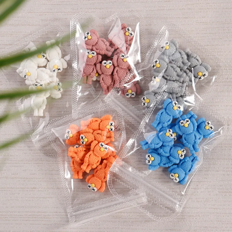 10PCS of PER PACK KAWS 28MM*19MM